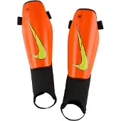 Nike Benskydd Charge Max Voltage - Orange/svart/neon, storlek Small/140-150cm