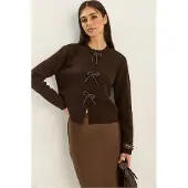 Bianco Rundhalsad stickad cardigan med rosettdetalj