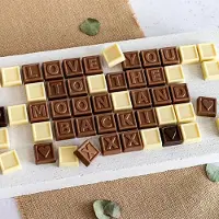 Smartphoto Choklad med text 60 bitar