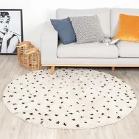 FRAAI Rund fluffig matta | Grand Dots gräddvit/svart | Ø 120 cm | Polypropen | Prickar | Rund | Hög lugg