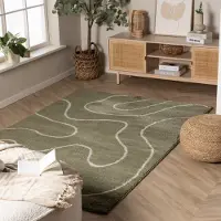 Rugaia Tvättbar matta | Myrre Swirl grön hos Volero | 140x200cm | Återvunnen polyester | Asymmetrisk | Rektangulär | Låg lugg