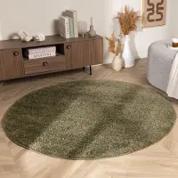 NATURL. Rund fluffig matta | Wish grön hos Volero | Ø 80cm | Polypropen | Enfärgad | Rund | Hög lugg