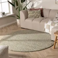 NATURL. Rund ullmatta | Feline grön/melerad hos Volero | Ø 120 cm | Ull | Blandat | Rund | Plattvävd