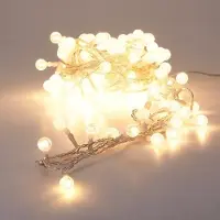 Springos Julljusslinga 120 LED med dekorativ kula varmvit