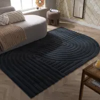 FRAAI Oregelbunden matta | Flowy Wavy antracit hos Volero | 140x200 cm | Polyester | Asymmetrisk | Oregelbunden form | Hög lugg