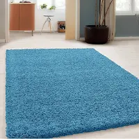 NATURL. Fluffig matta | Solid turkos hos Volero | 80x150 cm | Polypropen | Enfärgad | Rektangulär | Hög lugg