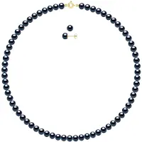 ATELIERS SAINT GERMAIN Uppsättningen består av : Halsband av äkta odlade sötvattenspärlor, halvrunda 6-7 mm