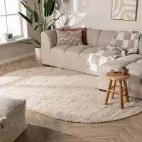 NATURL. Oval ullmatta | Feline vit/melerad hos Volero | 122x183 cm | Ull | Blandat | Oval | Plattvävd