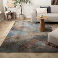 Studio Clarice Industriell matta | Raphael blå/terrakotta hos Volero | 160x230 cm | Polypropen | Asymmetrisk | Rektangulär | Hög lugg