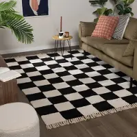 FRAAI Rutig matta | Blox Fringe svart hos Volero | 80x150 cm | Bomull | Block | Rektangulär | Låg lugg