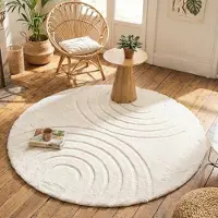 FRAAI Rund fluffig matta | Carvy Arches gräddvit hos Volero | Ø 120 cm | Polyester | Symmetrisk | Rund | Hög lugg