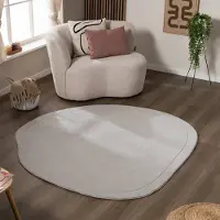FRAAI Organisk matta | Halo Stone grå hos Volero | Ø 160 cm | Polyester | Enfärgad | Oregelbunden form | Låg lugg