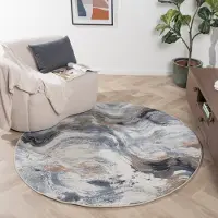Studio Clarice Rund abstrakt matta | Xavier Wave blå/grå hos Volero | Ø 160 cm | Polypropen | Abstrakt | Rund | Låg lugg