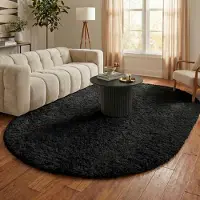 NATURL. Oval fluffig matta | Blaze svart hos Volero | 160x230 cm | Syntet | | Oval | Hög lugg