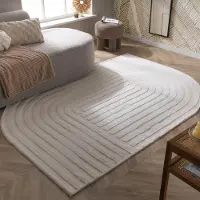 FRAAI Oregelbunden matta | Flowy Lines gräddvit hos Volero | 80x150 cm | Polyester | Bågar | Oregelbunden form | Hög lugg