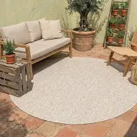 NATURL. Rund utomhusmatta | Costa sand hos Volero | Ø 100 cm | Syntet | Enfärgad | Rund | Plattvävd