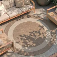 FRAAI Rund utomhusmatta | Sierra Border beige/gräddvit | Ø 80 cm | Polypropen | Med kant | Rund | Plattvävd