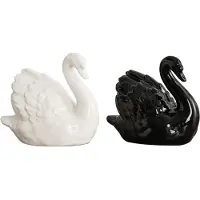 Typecat delar vit svart svan skulpturdekor, elegant keramisk svanpar