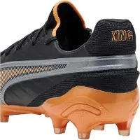 Puma Fotbollsskor King Ultimate Firm Ground för herrar (Svart/orange)