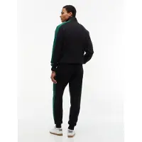 Tommy Hilfiger Träningsoverall 'ESS' jade / svart