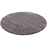 NATURL. Rund fluffig matta | Solid mörkgrå hos Volero | Ø 100cm | Grå | Jute | Rund | Inomhusmattor