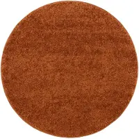 NATURL. Rund fluffig matta | Wish terrakotta hos Volero | Ø 120cm | Terra | Jute | Rund | Inomhusmattor